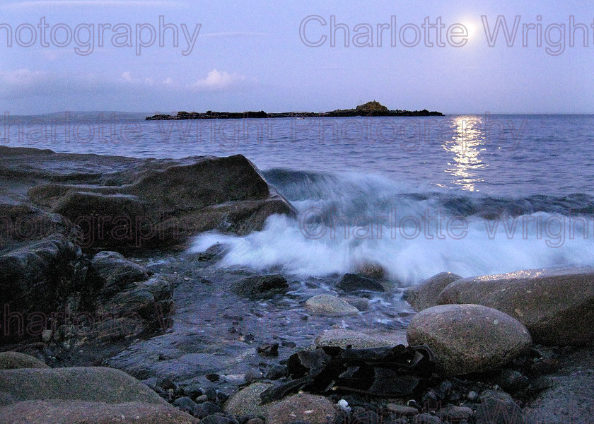 IMG 1435 
 The sea at dusk on Mousehole's pebble beach in Cornwall. The moon was so bright this was handheld! Photographed by myself, Charlotte Wright Photography 
 Keywords: waves, stone, moon, pebble, beach, St Clemants Isle, Mousehole, cornwall, sea, United Kingdom, photography